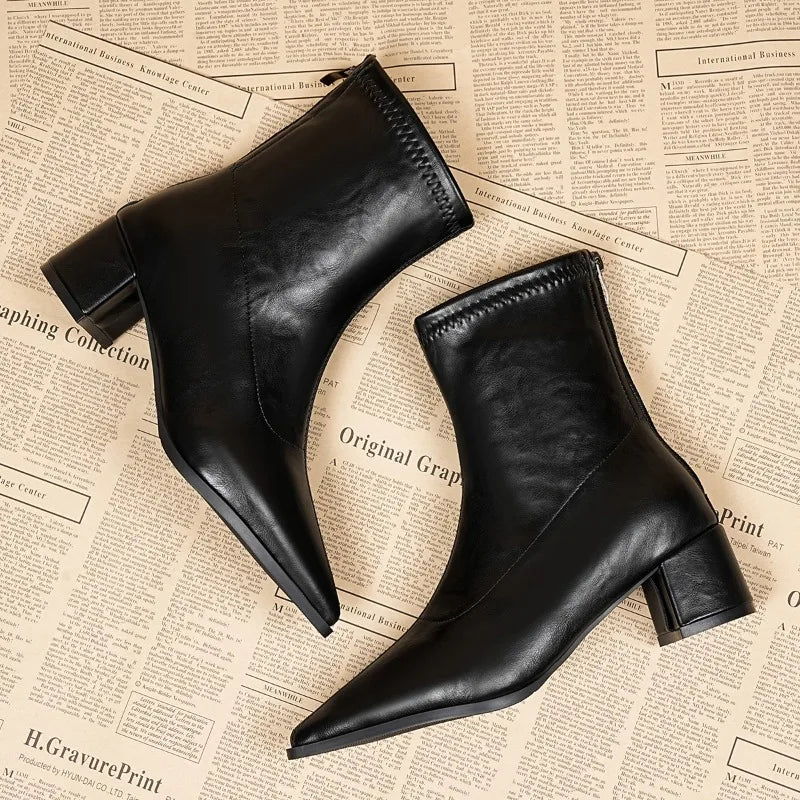 NoirEdge Sculpt Ankle Boots